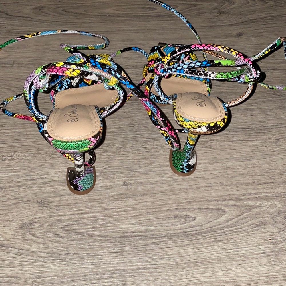 Women multicolored heels.